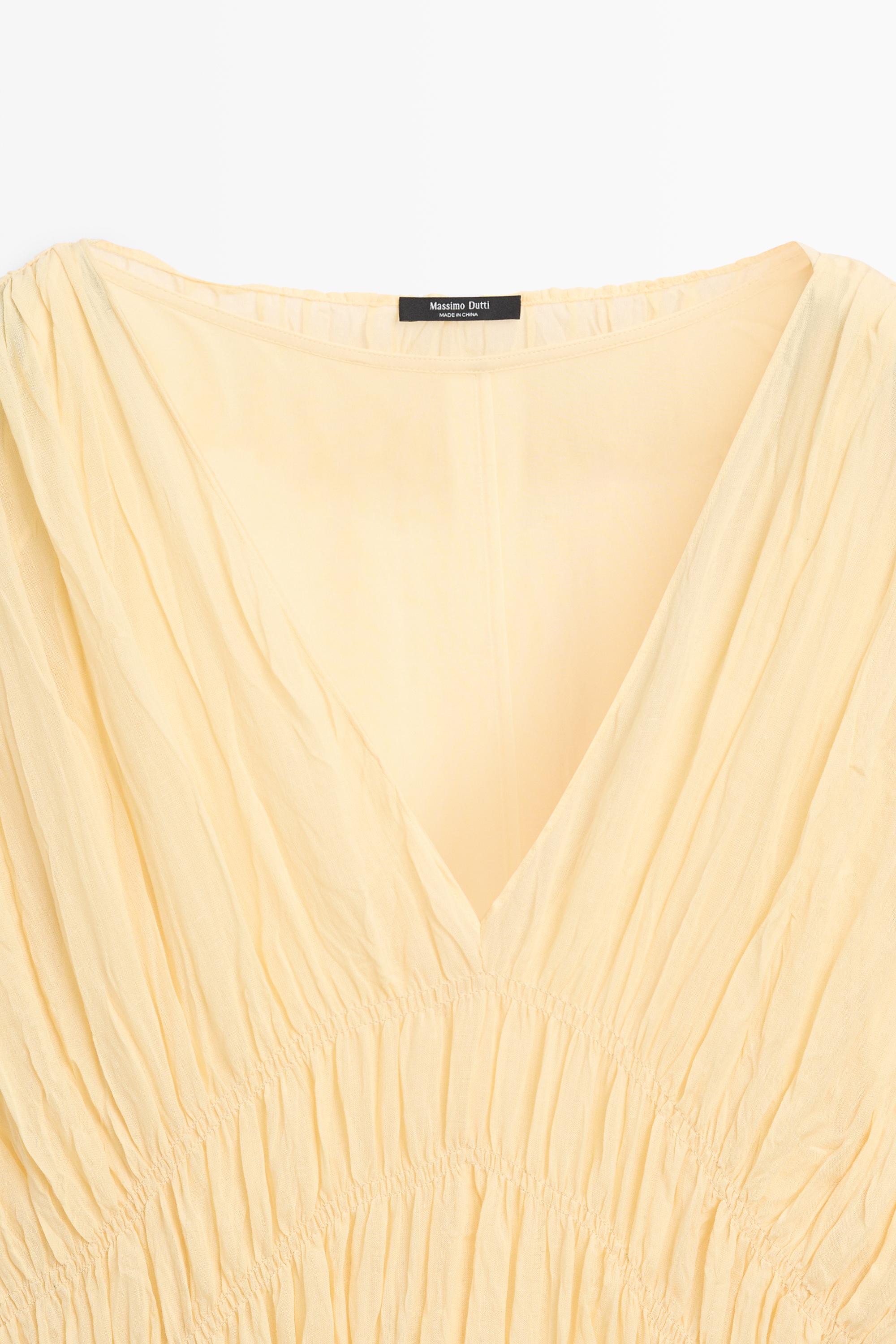 Robe midi fluide froncée